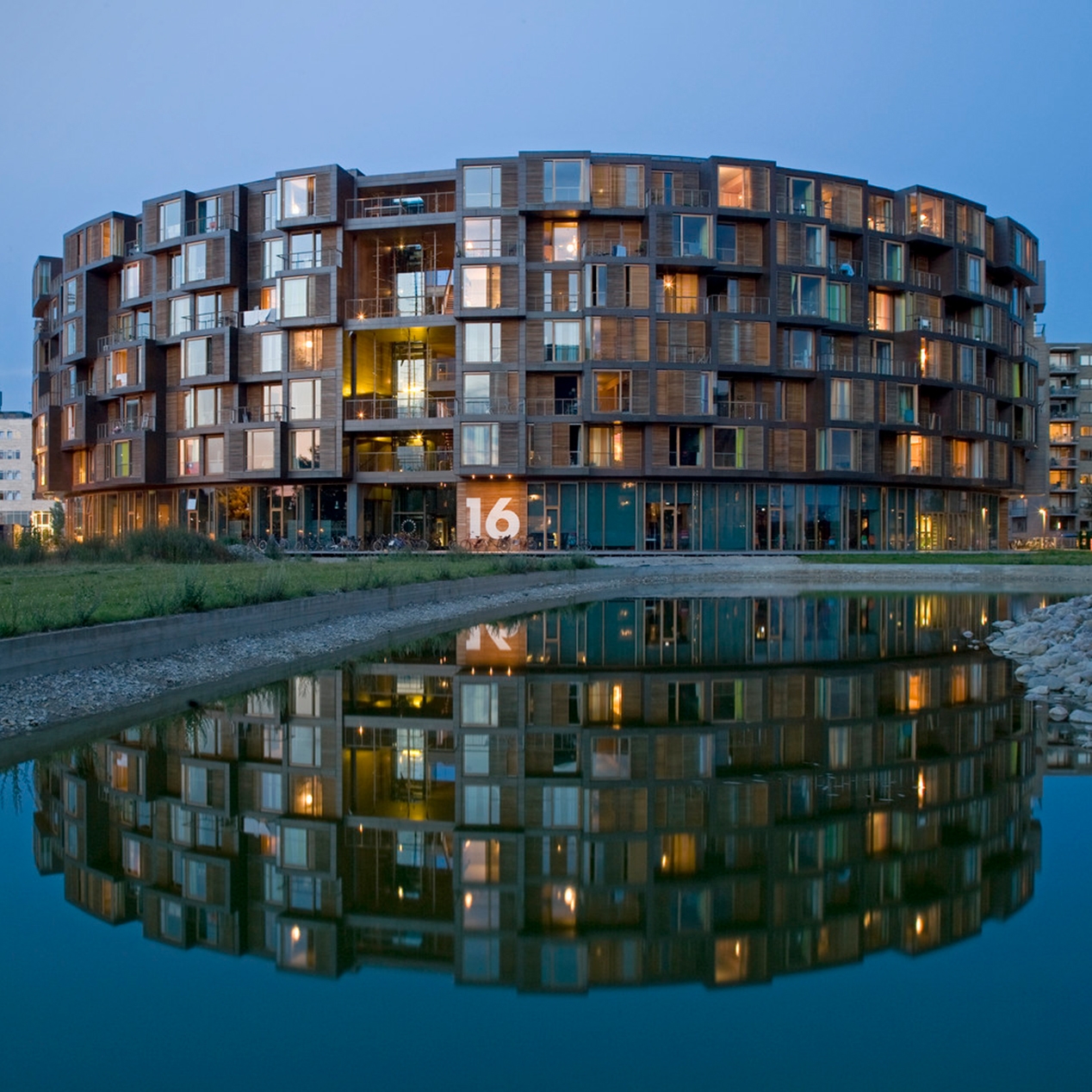 A central courtyard at the heart of the circle-round Tietgen Dormitory creates a secure outdoor environment where students feel safe and protected, yet still experience a sense of connection to the larger student housing community. — Lundgaard & Tranberg Architects, image courtesy of Lundgaard & Tranberg