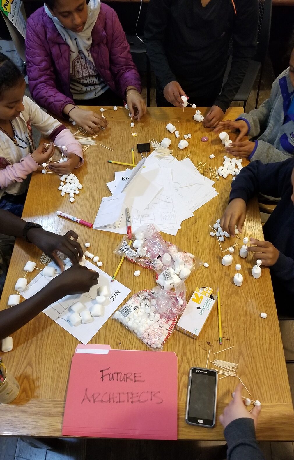 Architects from NAC volunteer with young students at the Bureau of Fearless Ideas in Seattle, teaching them that anyone - yes anyone! - can be an architect. BFI offers after school care for underserved students free of charge. Read more. This rewarding experience has recently led to an AIA Diversity Recognition Program. 