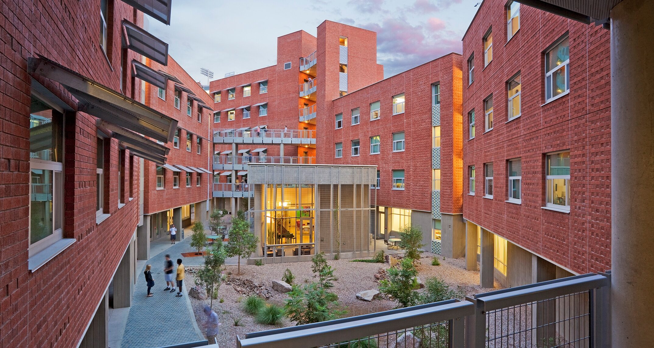 University of Arizona’s Likins Hall is wrapped around a central garden that resembles the rocky creek bed of an arroyo. Not only does this feature collect runoff and engage students in environmental stewardship, it builds respect and appreciation for the desert context surrounding the campus.” — NAC Architecture