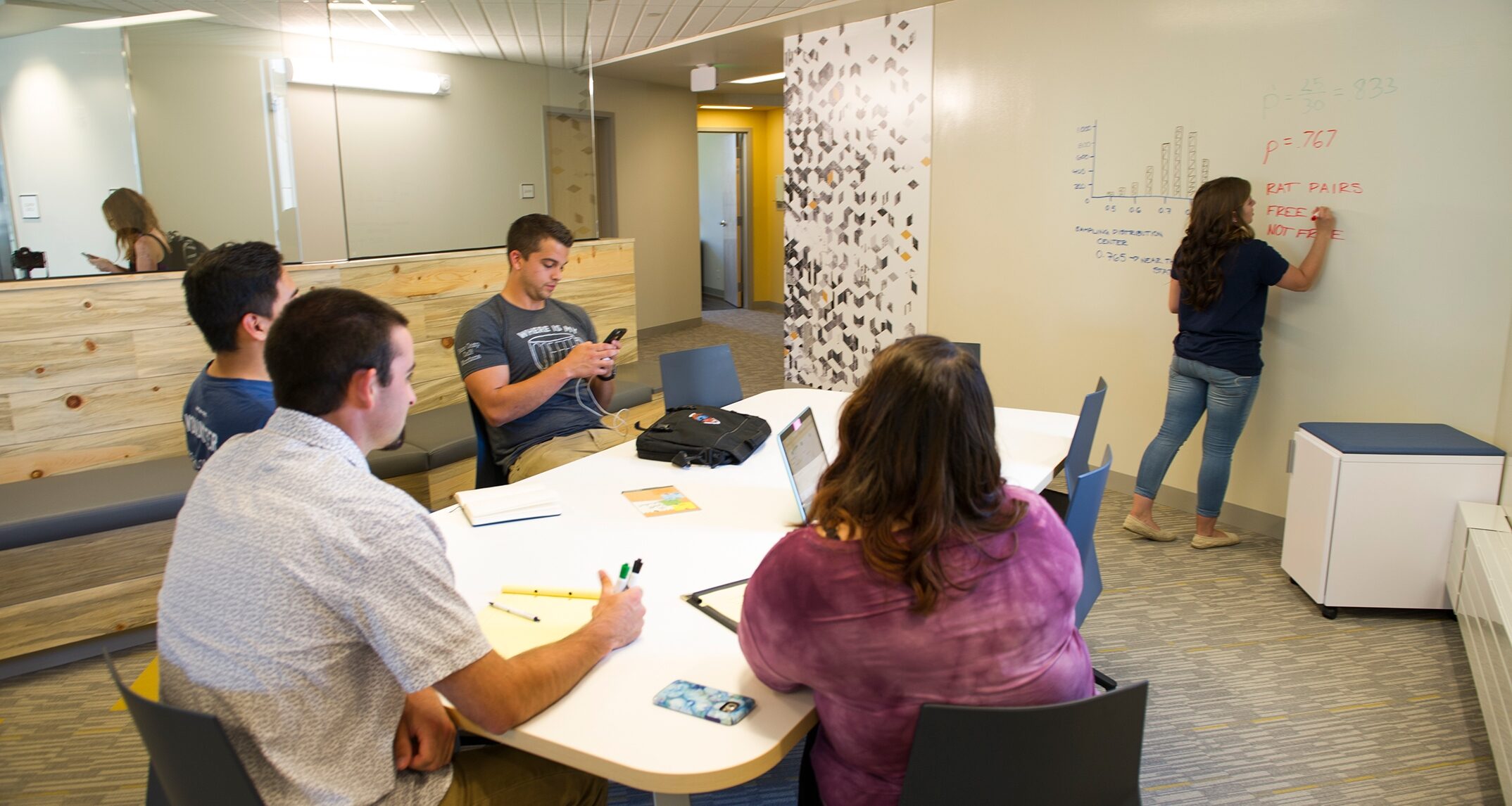 Each floor of Yellowstone Hall features a study space with dry
erase walls and technology hookups that allow students to collaborate on group
projects or study outside of the classroom. Photo by Kelly Gorham. 